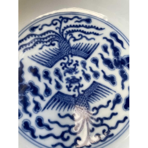 309 - A Chinese blue & white double phoenix dish, six character mark of Guangxu, painted with two phoenix ... 