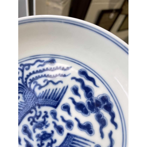 309 - A Chinese blue & white double phoenix dish, six character mark of Guangxu, painted with two phoenix ... 