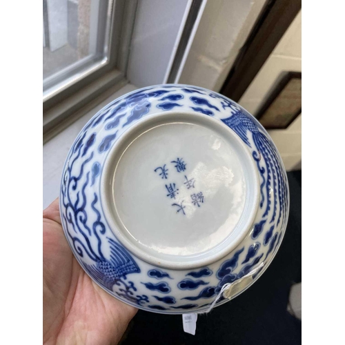 309 - A Chinese blue & white double phoenix dish, six character mark of Guangxu, painted with two phoenix ... 