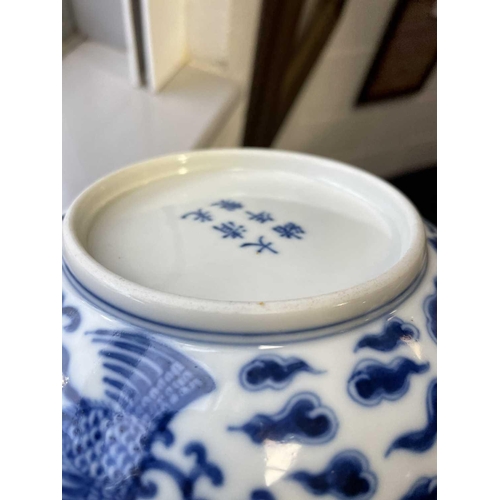 309 - A Chinese blue & white double phoenix dish, six character mark of Guangxu, painted with two phoenix ... 