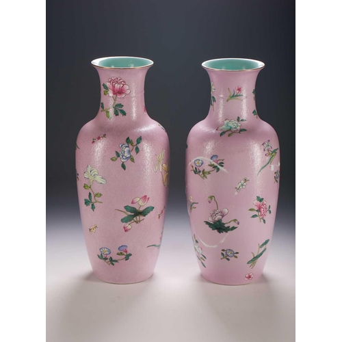 317 - A pair of Chinese Famille Rose vases, finely painted with blossoming Carnations, Convolvulus, Peony,... 