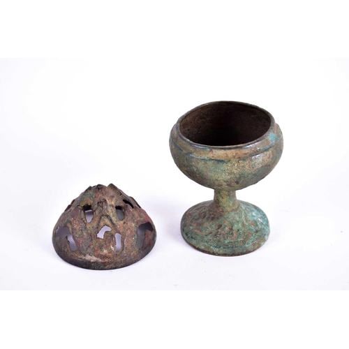 324 - A Chinese bronze Boshanlu 'Hill' censer, Han dynasty, the openwork cover cast as mountains, on a ste... 