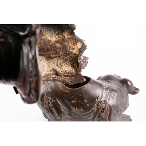 325 - A Chinese bronze figure of Wenshu (Manjusri), Qing, seated in lalitasana upon a Buddhistic lion, dec... 