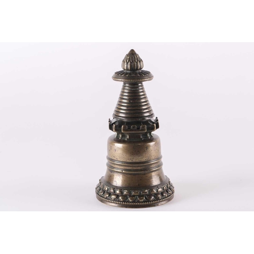 327 - A Tibetan bronze Stupa, 13th/14th century, the lotus bud above a petal moulded and beaded parasol on... 