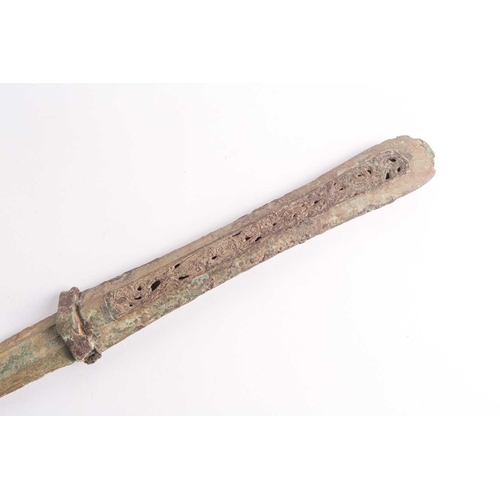 333 - An early Chinese bronze sword, possibly Han dynasty, with a shallow central fullered blade, the hand... 