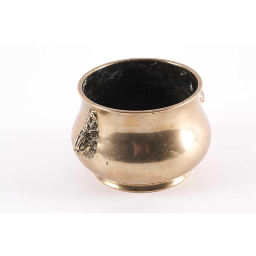 337 - A Chinese bronze censer, Qing, 18th century, of slightly swollen form with stylised lion mask handle... 