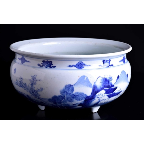 73 - A large Chinese porcelain blue & white Kangxi style censer, painted with scholarly figures in a moun... 