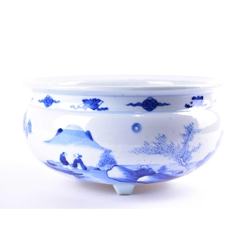 73 - A large Chinese porcelain blue & white Kangxi style censer, painted with scholarly figures in a moun... 