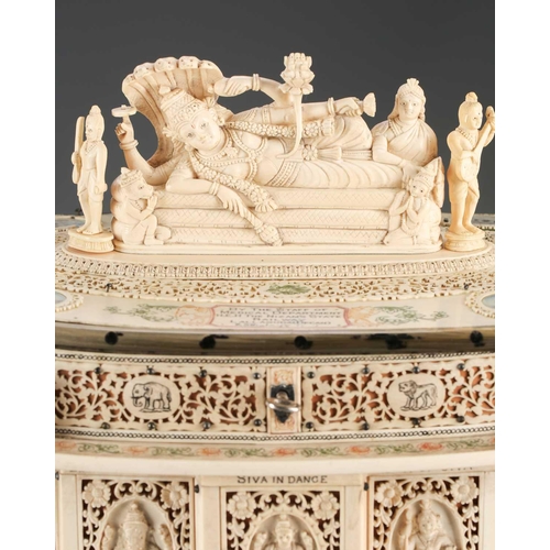 76 - An impressive Indian ivory casket, 19th century, the hinged cover mounted with a recumbent Lord Vish... 