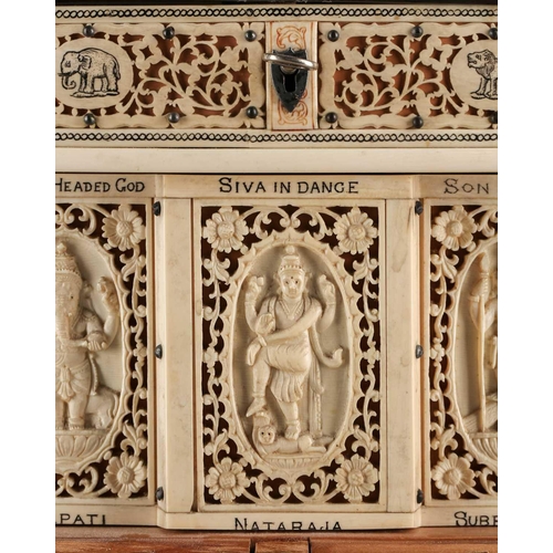 76 - An impressive Indian ivory casket, 19th century, the hinged cover mounted with a recumbent Lord Vish... 