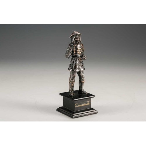 78 - A Japanese silver figure of a Samurai warrior, Meiji period, standing in full armour, the helmet and... 