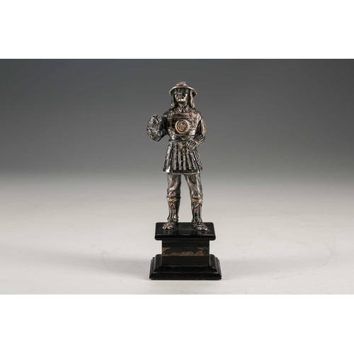 78 - A Japanese silver figure of a Samurai warrior, Meiji period, standing in full armour, the helmet and... 