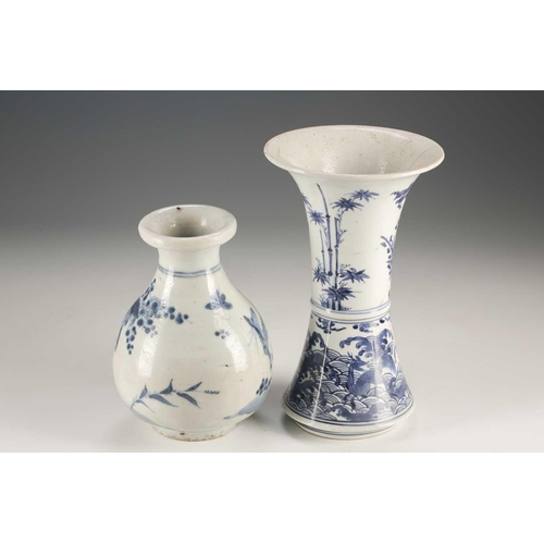 94 - A Japanese blue & white vase, Edo, mid 17th century, the folded over rim above birds in blossoming p... 