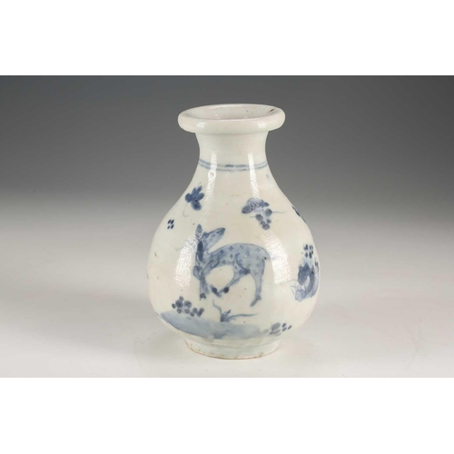 94 - A Japanese blue & white vase, Edo, mid 17th century, the folded over rim above birds in blossoming p... 