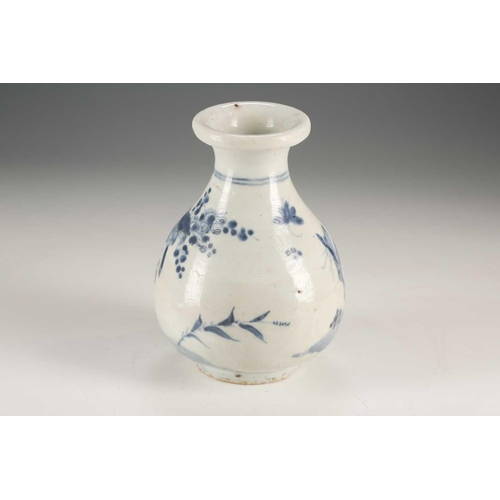 94 - A Japanese blue & white vase, Edo, mid 17th century, the folded over rim above birds in blossoming p... 