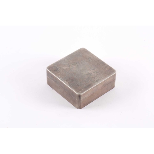 95 - A Chinese white metal inkstone box, Republic period, of square form, the cover engraved with a garde... 