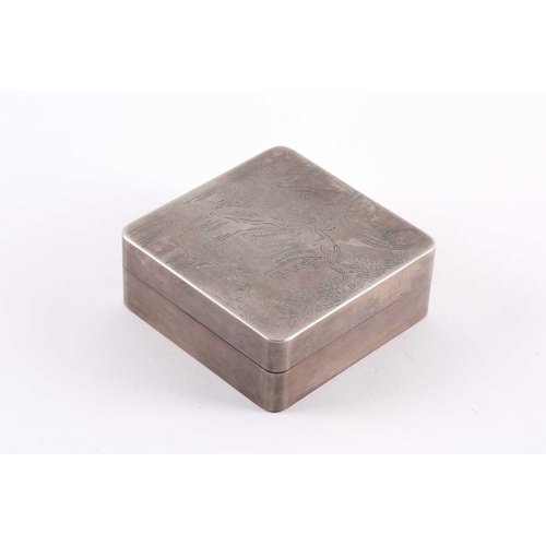 95 - A Chinese white metal inkstone box, Republic period, of square form, the cover engraved with a garde... 