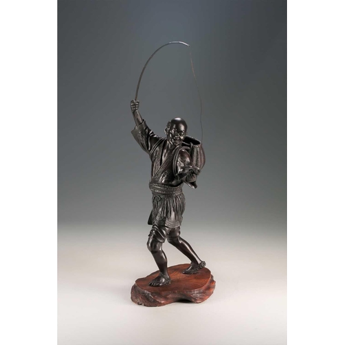 97 - A Japanese bronze fisherman signed Atsuyoshi, standing with a joyous expression upon his face, a fis... 