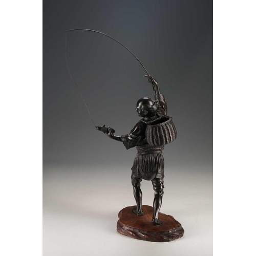 97 - A Japanese bronze fisherman signed Atsuyoshi, standing with a joyous expression upon his face, a fis... 