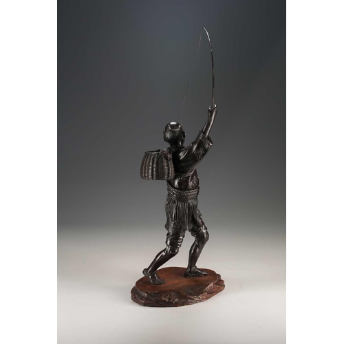 97 - A Japanese bronze fisherman signed Atsuyoshi, standing with a joyous expression upon his face, a fis... 