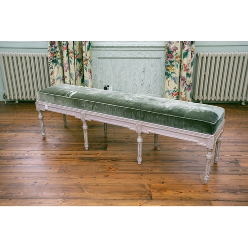 98 - A Louis Philippe style painted and distressed banquette with stuff over velvet upholstery on a mould... 