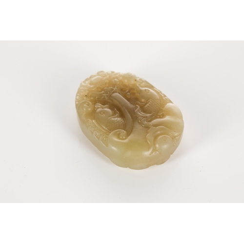 103 - A Chinese jade pendant, of oval form, each side carved with a dragon above two fish, a stream of wat... 