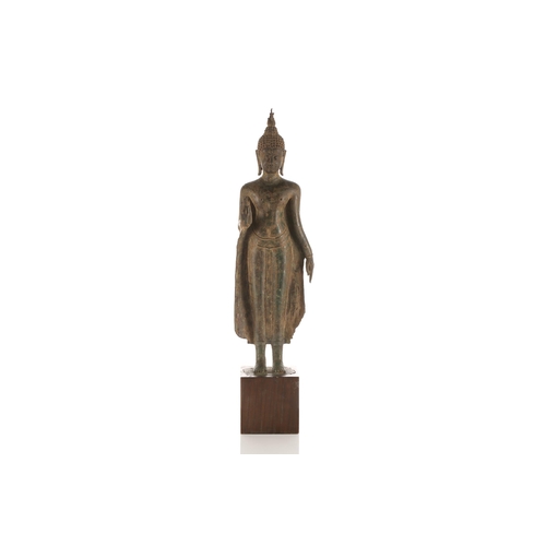 104 - A Thai bronze figure of Buddha, 17th/18th century, standing in Abhaya Mudra, with a flaming ushnisha... 