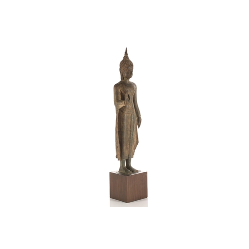 104 - A Thai bronze figure of Buddha, 17th/18th century, standing in Abhaya Mudra, with a flaming ushnisha... 