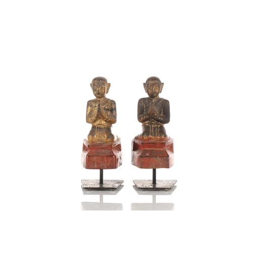 105 - A pair of Burmese carved painted and gilt kneeling monk figures thought to be Ava period 1364-1555. ... 