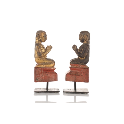 105 - A pair of Burmese carved painted and gilt kneeling monk figures thought to be Ava period 1364-1555. ... 