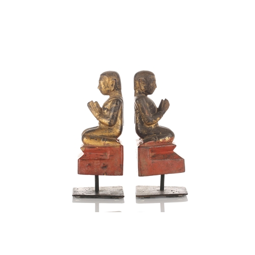 105 - A pair of Burmese carved painted and gilt kneeling monk figures thought to be Ava period 1364-1555. ... 