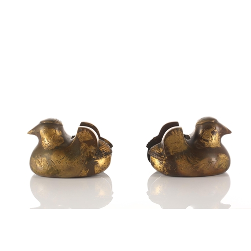 109 - A pair of Japanese patinated bronze byobu screen stands in the form of Mandarin ducks, Probably late... 