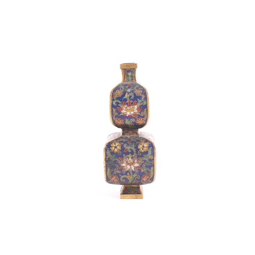 119 - A Chinese cloisonne enamel and gilt metal double gourd vase, Qing, 19th century, of square form, the... 