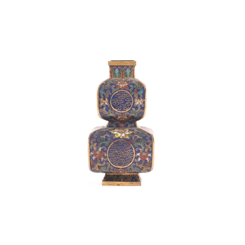 119 - A Chinese cloisonne enamel and gilt metal double gourd vase, Qing, 19th century, of square form, the... 