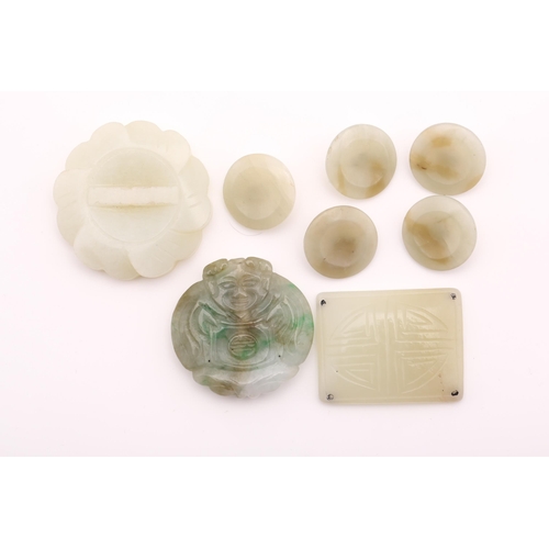 123 - Two Chinese carved jade pendants, a rectangular jade applique and five jade buttons