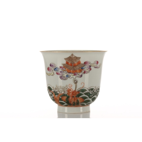 124 - A Chinese porcelain wine cup, the exterior finely painted with two dragon carp in spuming waves and ... 