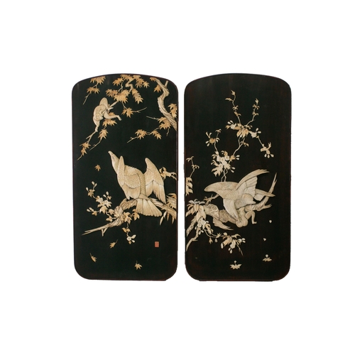 127 - A pair of Japanese panels, Meiji period, late 19th century, inlaid and applied with carved bone, dep... 