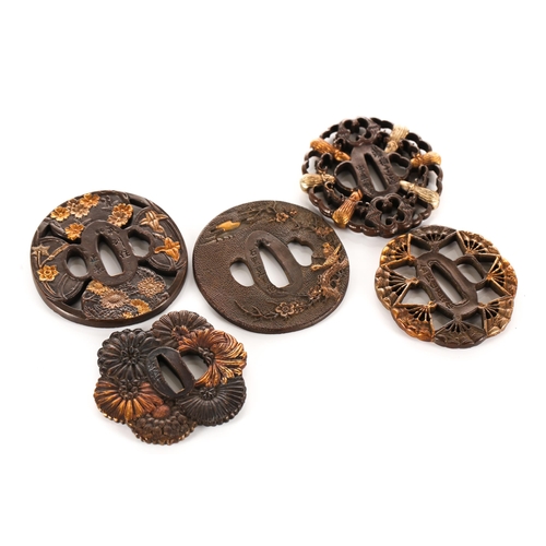 129 - A collection of five Japanese patinated and faux mixed metal Tsuba, decorated variously with stylize... 