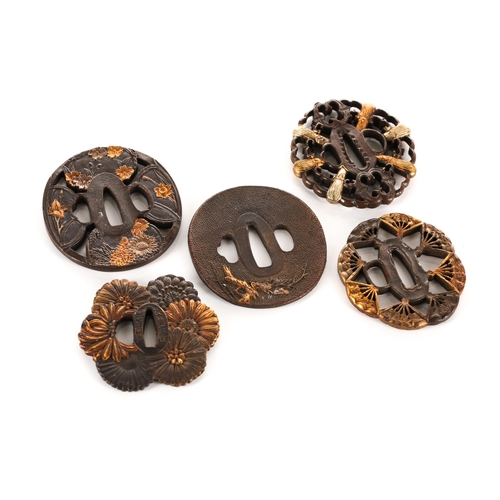 129 - A collection of five Japanese patinated and faux mixed metal Tsuba, decorated variously with stylize... 