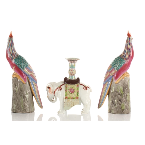 133 - A Pair of Chinese porcelain pheasants, late 20th century, each standing on a pierced rockwork mand f... 