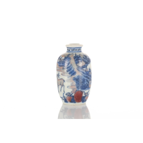 170 - A Chinese porcelain miniature vase, Republic period, painted in blue & white with iron red depicting... 