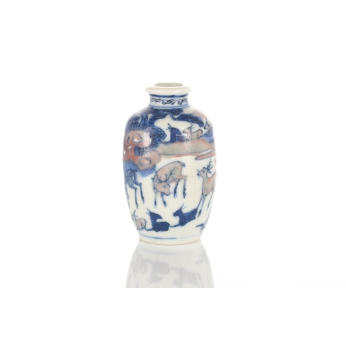 170 - A Chinese porcelain miniature vase, Republic period, painted in blue & white with iron red depicting... 