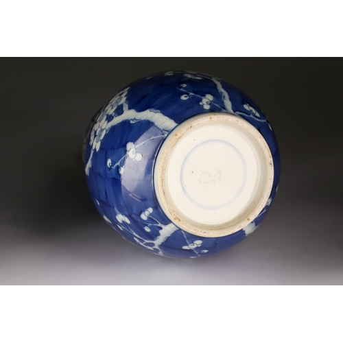 178 - A Chinese Huluping (double gourd) blue and white vase, painted with branches of blossoming prunus, a... 