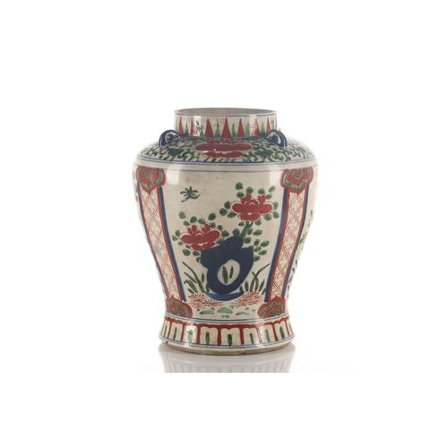 189 - A Chinese Transitional Wucai porcelain vase, 17th century, the shoulder with applied and pierced lug... 