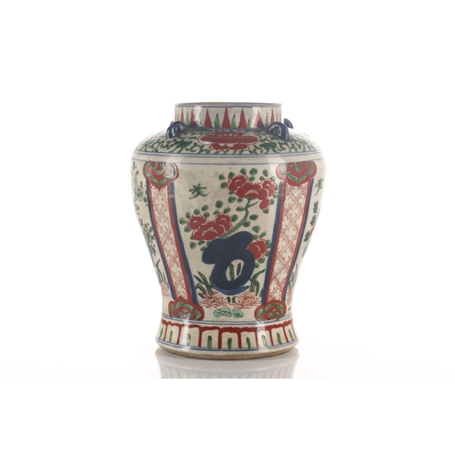 189 - A Chinese Transitional Wucai porcelain vase, 17th century, the shoulder with applied and pierced lug... 