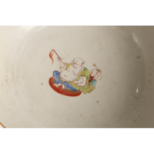 212 - A Chinese famille rose bowl, Qing, late 18th century, the interior painted with Budai and a young bo... 