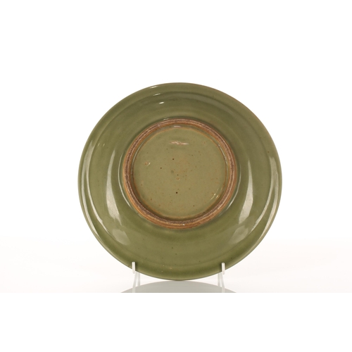 216 - A Chinese Ming Dynasty style Longquan Celadon circular 