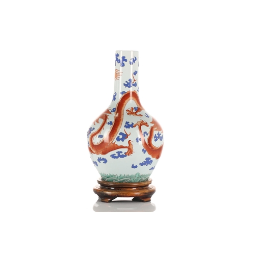 222 - A Chinese porcelain Tianqiuping shape vase, Republic Period, painted with two iron red dragons chasi... 