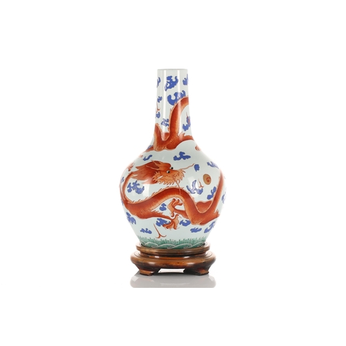 222 - A Chinese porcelain Tianqiuping shape vase, Republic Period, painted with two iron red dragons chasi... 