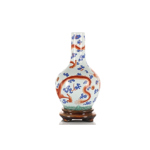 222 - A Chinese porcelain Tianqiuping shape vase, Republic Period, painted with two iron red dragons chasi... 